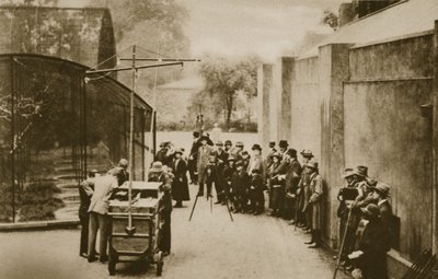 Officials of the British Broadcasting Corporation, preparing to broadcast noises from the aviary at London Zoo by English Photographer